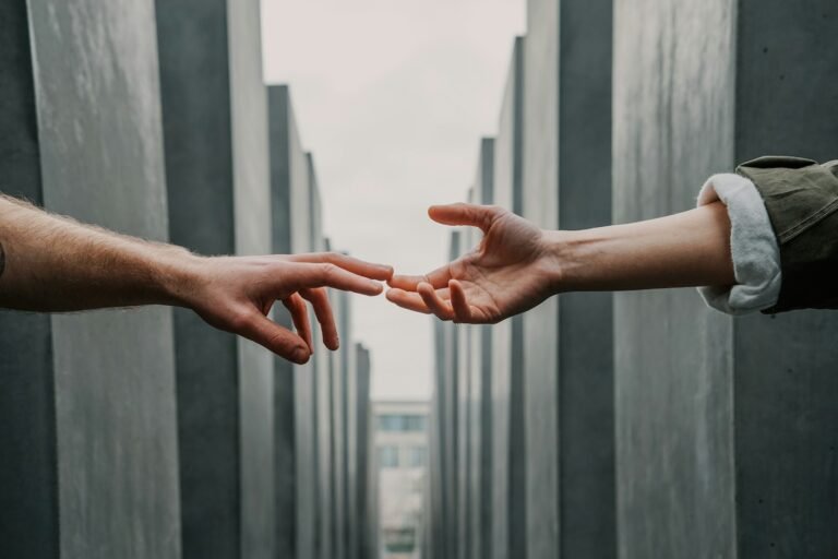 Hands Reaching Together in Communal Care and Solidarity